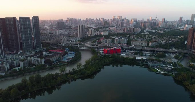 sunset over the river aerial cityscape iof Chengdu China