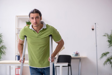 Young man waiting for doctor in the clinic
