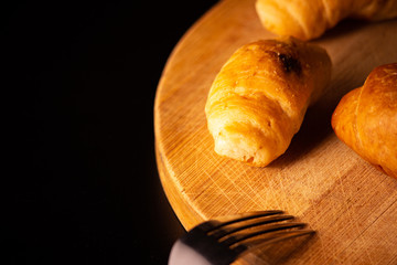 croissant on wood