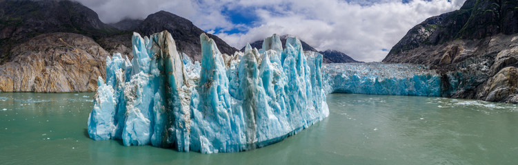 USA, Alaska, Tracy Arm-Fords Terror Wilderness, Aerial panoramic view of blue face of Dawes Glacier on summer morning