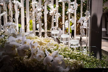 Elegant outdoors summer wedding with flowers decoration and mirrors