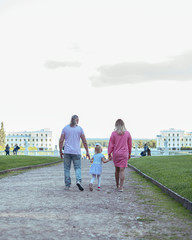 A family running together in a park