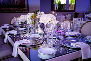 Elegant outdoors summer wedding with flowers decoration and mirrors