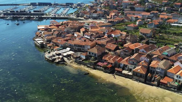 Combarro, beautiful coastal village with horreos. Pontevedra,Galicia,Spain. Aerial Drone Footage