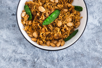 plant-based food, vegan ginger noodles with butter beans and snap peas