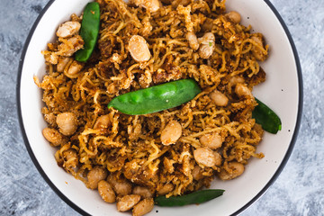 plant-based food, vegan ginger noodles with butter beans and snap peas