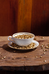 CUP WITH GOLDEN COFFEE GRANTS 12