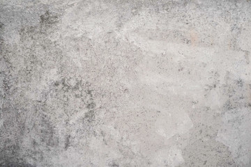 Texture of a smooth gray concrete wall as background or wallpaper. Close up of concrete wall with rough texture. Cement texture.