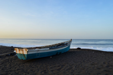 A fishing boat on the beach