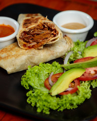 Pastor beef burrito and avocado