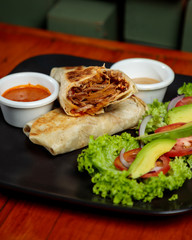Pastor beef burrito and avocado