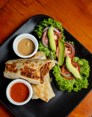 Pastor beef burrito and avocado