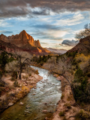 USA, Utah, Zion National Park, Sunset lights up The Watchman and the Virgin River - obrazy, fototapety, plakaty