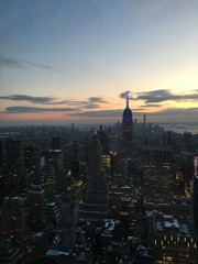 Naklejka premium new york city skyline at sunset