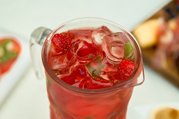 strawberries with ice and mint, Refreshing drink. Close-up.