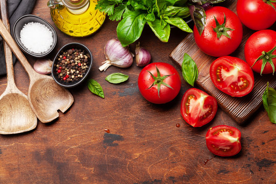 Italian cuisine ingredients. Tomatoes, herbs and spices