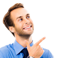 Portrait image of businessman showing something, isolated over white background. Success in business, job and education concept. Pointing confident man at studio. Square composition picture.