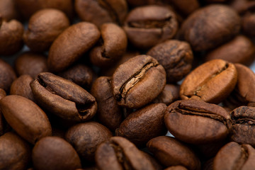 Coffee beans close-up background. Fresh roasted