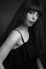 Naklejka premium black and white portrait of brunette with long hair