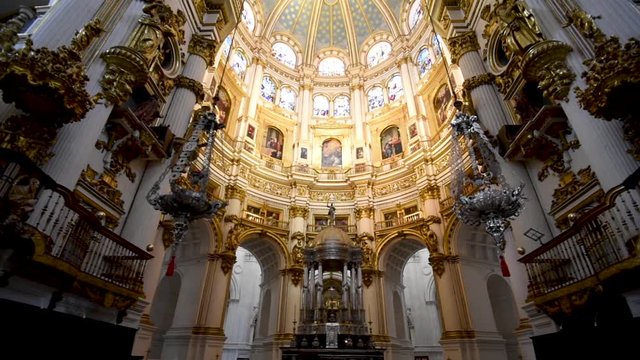 Pan shot of chapel inside the Roman Catholic Church Granada Spain
