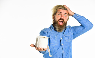 restroom products. man in public toilet. diarrhea concept. man holding paper roll in supermarket....