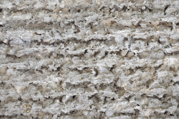 The concrete texture. A fragment of a concrete wall close-up.