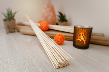 things for massage with bamboo sticks. Spa, wellness concept on bamboo background