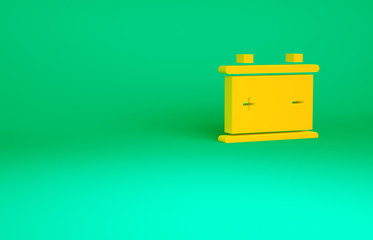 Orange Car battery icon isolated on green background. Accumulator battery energy power and electricity accumulator battery. Minimalism concept. 3d illustration 3D render.