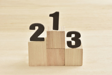 Podium on a wood background