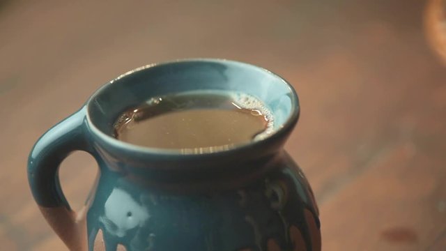 Caf&eacute; de olla con pan de muerto 