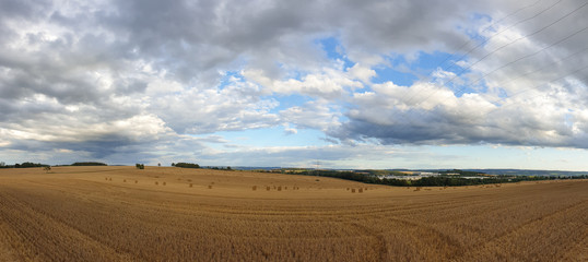 scenic panorama view of natural landscape under a cloudy sky