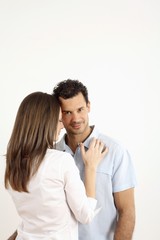 Man and woman together, man looking at the camera