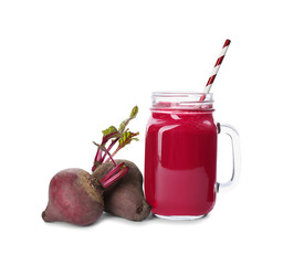 Fresh beets and juice isolated on white