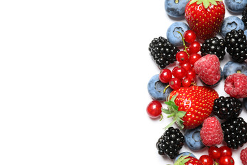 Mix of fresh berries on white background, flat lay