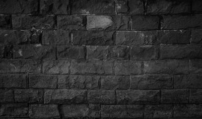 Abstract dark brick wall texture background pattern, Empty brick wall  surface texture. Brickwork painted black color interior old blank concrete grid uneven, Home office design backdrop decoration.