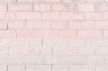 Empty Pink brick wall texture background in the bedroom at lovely. Brickwork stonework interior, rock old clean concrete grid uneven abstract weathered brick design, horizontal architecture wallpaper.