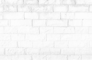 White brick wall texture background in room at subway. Brickwork