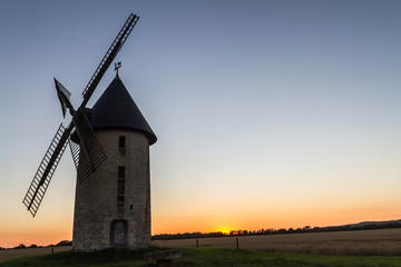 Plakat windmill at sunset