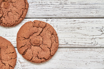 Top view of cookies on wooden background. Closeup