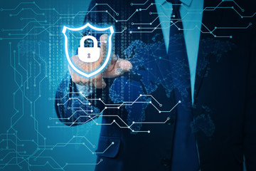 Cyber security concept. Man using virtual screen with padlock illustration, closeup