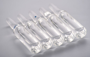Copy space photo medical ampoules on a white background. Close-up