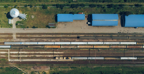 Top-down view to trains at railroad yard at station