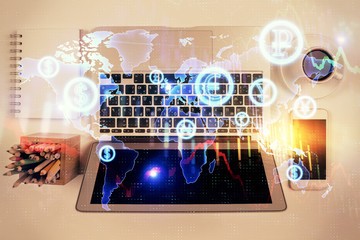 Stock market chart and top view computer on the table background. Multi exposure. Concept of financial analysis.