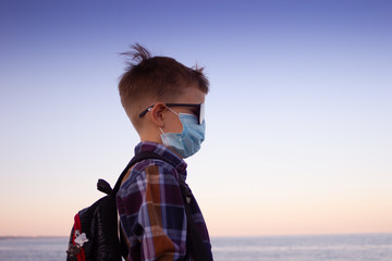 A boy on a walk in a pandemic