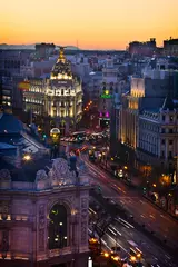 Stof per meter Metropolis building in Madrid in the evening © Dario