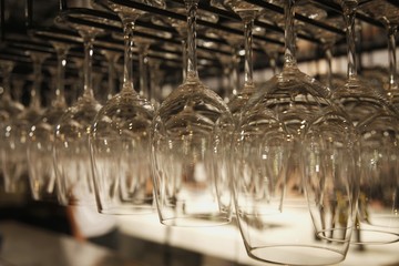 Rows of hanging wine glasses