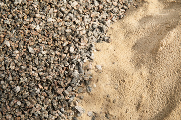 Construction materials sand pile and rocks rubble
