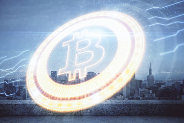 Double exposure of crypto currency theme hologram drawing and city veiw background. Concept of blockchain and bitcoin.