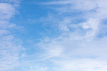 White clouds on a blue sky as background
