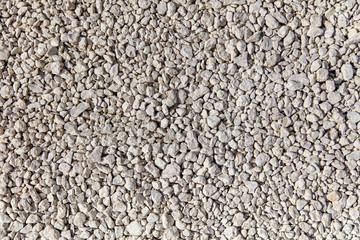 Stone gravel at a construction site as a background.